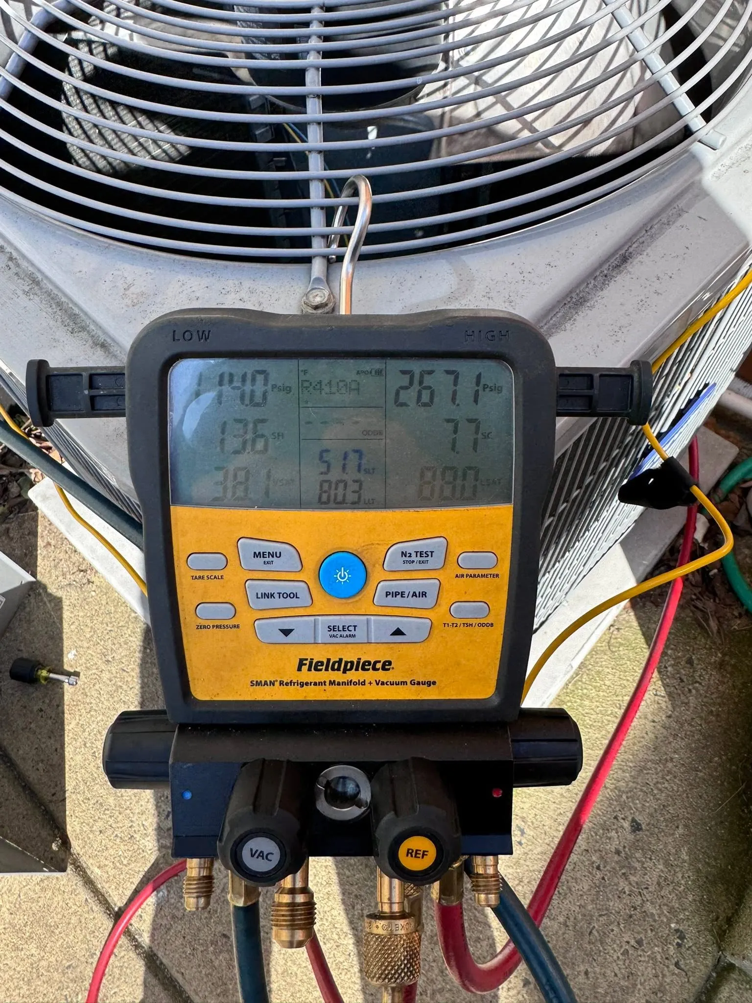Refrigerant manifold gauge reading pressures on a South Philadelphia AC diagnostic call